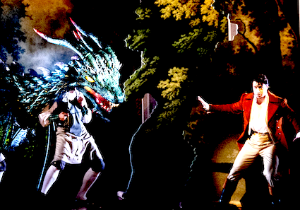Tamino chased by a dragon-headed monster in The Magic Flute at Santa Fe Opera, 2026.
